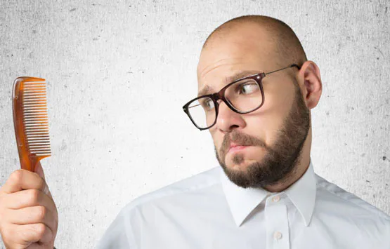 Why do bearded men go bald?